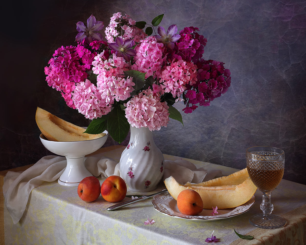 With a bouquet of phlox and melon